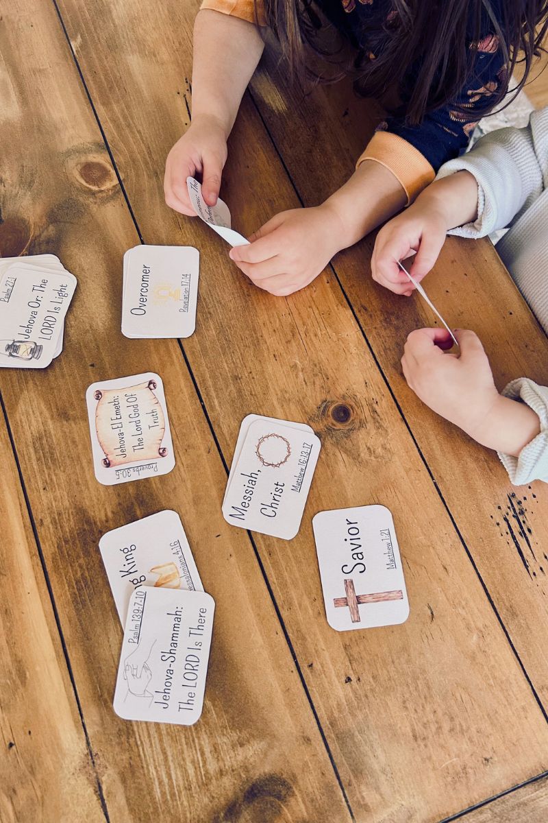 names of God flashcards on table